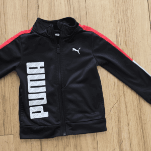 Black Puma jacket with red stripes and bold white logo.