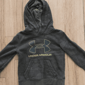 Dark grey Under Armour hoodie with front pocket and logo.