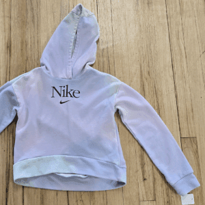 White Nike hoodie with visible wear and frayed hood stitching.