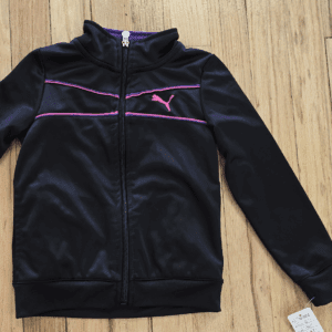 Black Puma jacket with purple accents and zipper front.