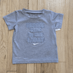 Gray Nike toddler t-shirt with a motivational slogan.